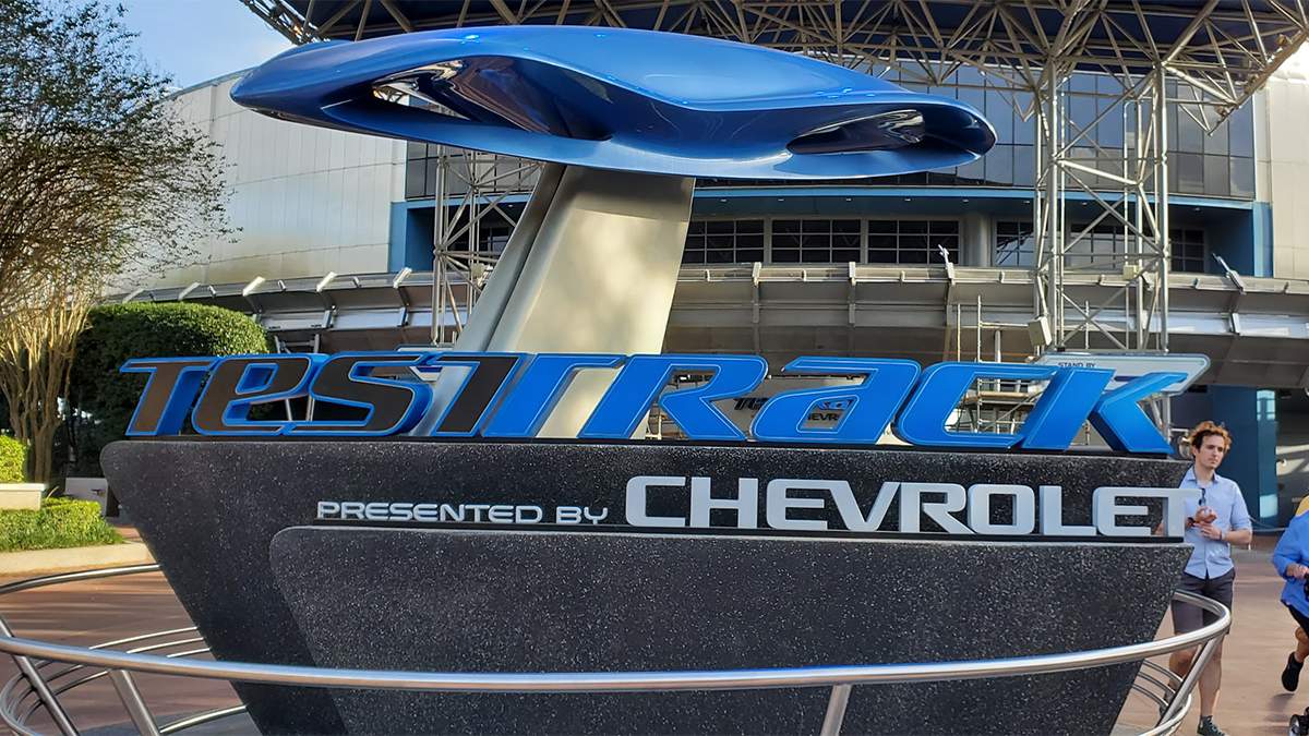 Close up of the blue and grey sign for the Epcot Test Track at Disney in Orlando, Florida, USA